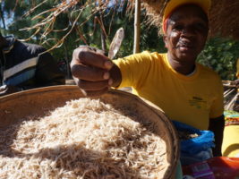 Women groups presenting their fish